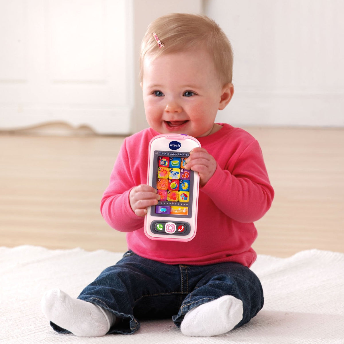 VTech electronic learning toy phone packaged for toddlers and young children.
