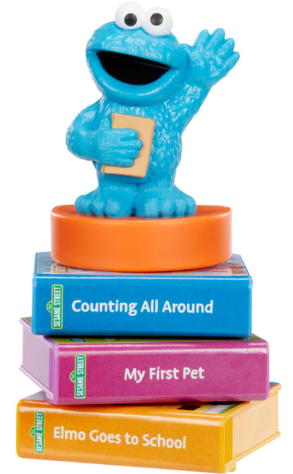 Close up view of the Cookie Monster character piece snapping onto the story projection system for nighttime light mode
