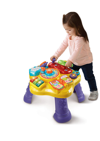 Removable toy smartphone accessory detached from the pink learning table hub.