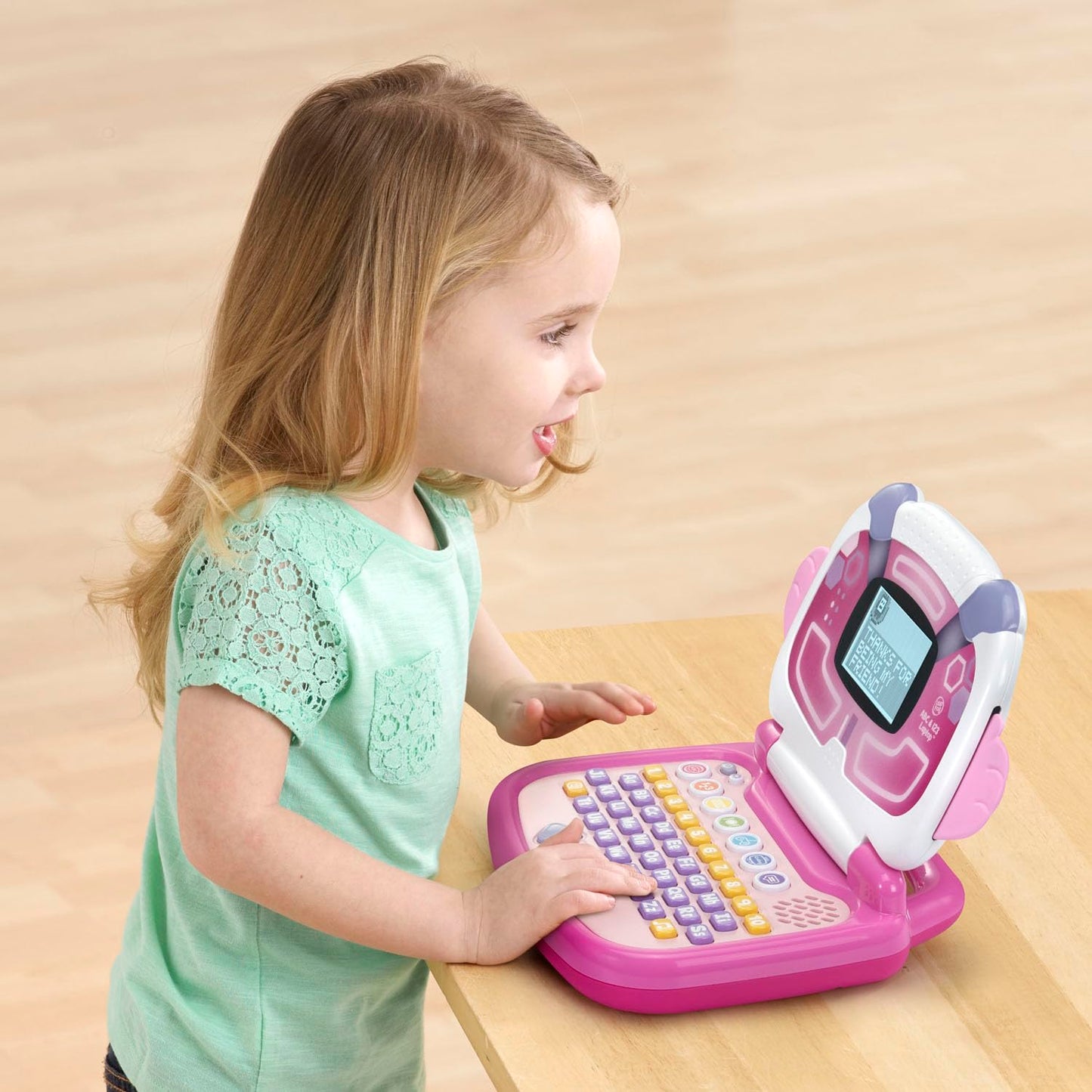LeapFrog pink electronic toy laptop featuring the light up antenna design