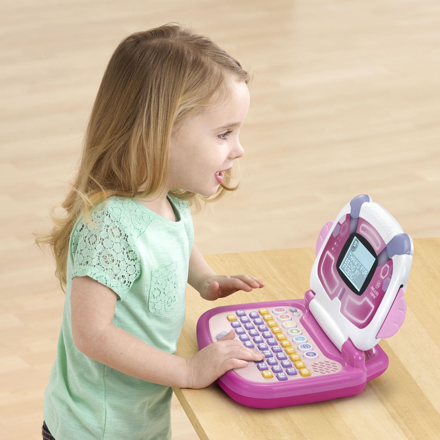 LeapFrog pink electronic toy laptop featuring the light up antenna design