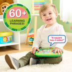 Just Play electronic toddler tablet toy showcasing the music note button for singing along.