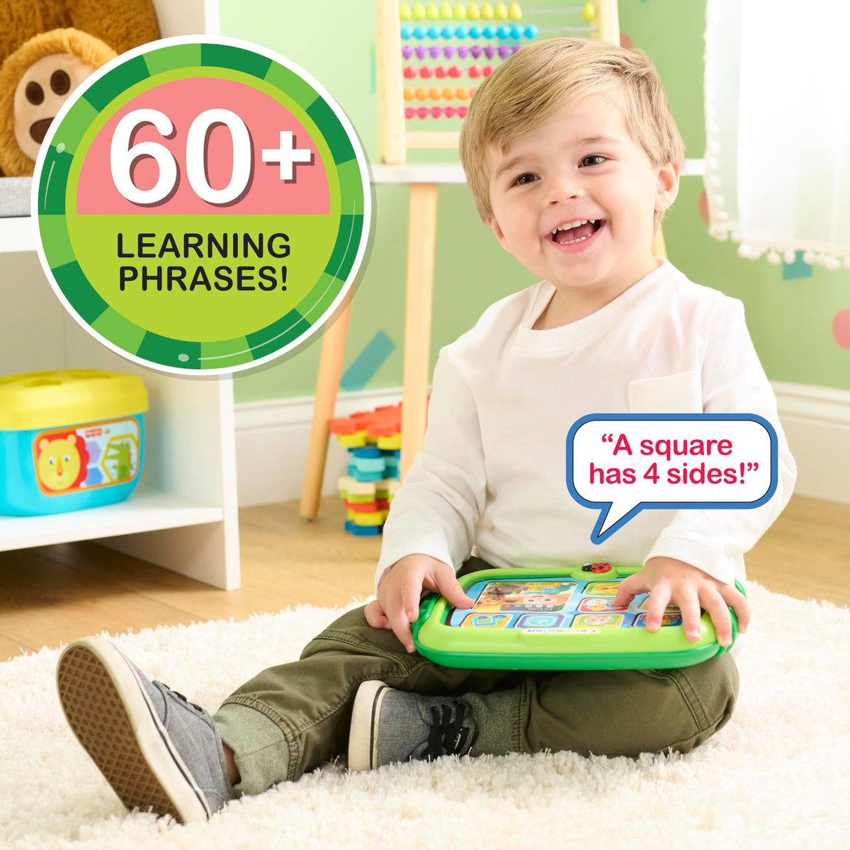 Just Play electronic toddler tablet toy showcasing the music note button for singing along.
