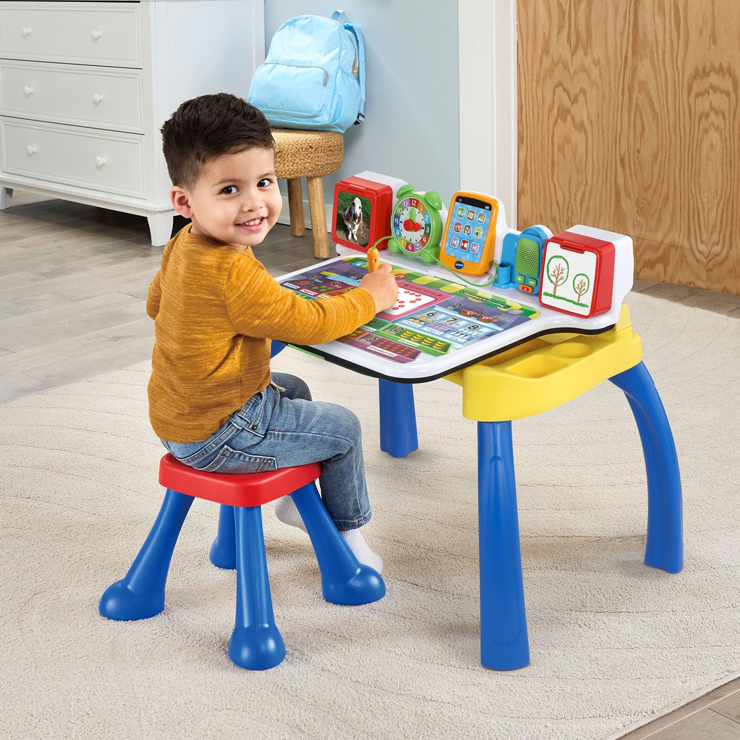VTech electronic activity desk showcasing the integrated toy tablet and play clock