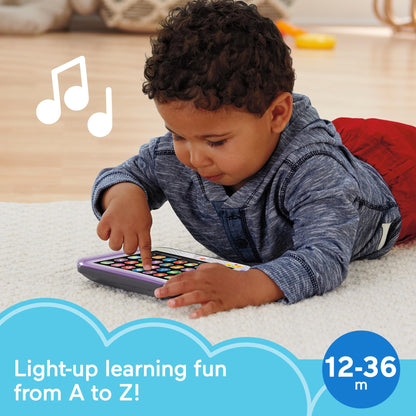 Fisher-Price electronic learning toy showing the active multi-color lights glowing along the borders during musical playback.