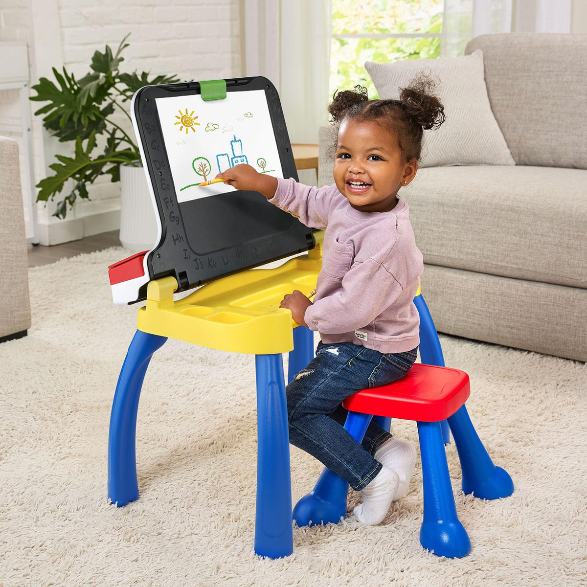 Blue VTech kids workstation with the matching preschooler seating stool