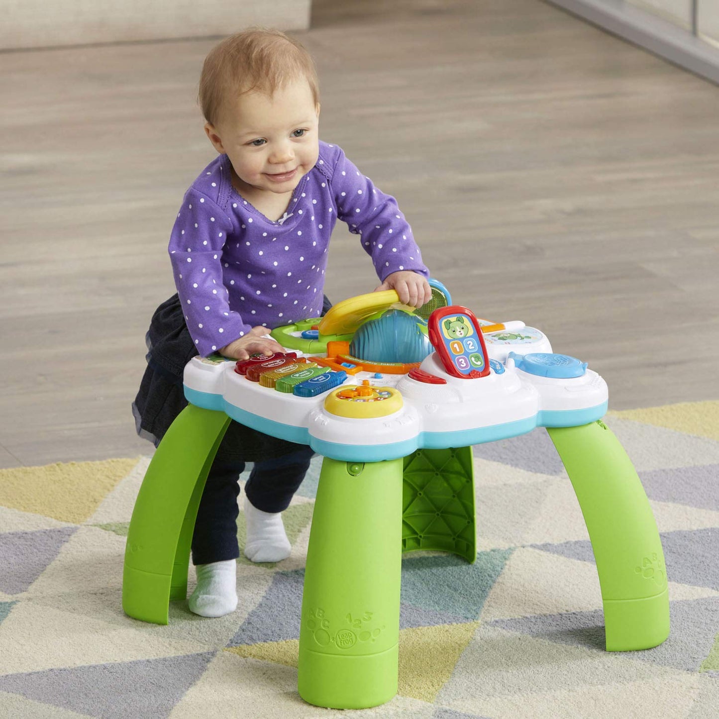 Close up of electronic touch points and toy phone on the LeapFrog office toy