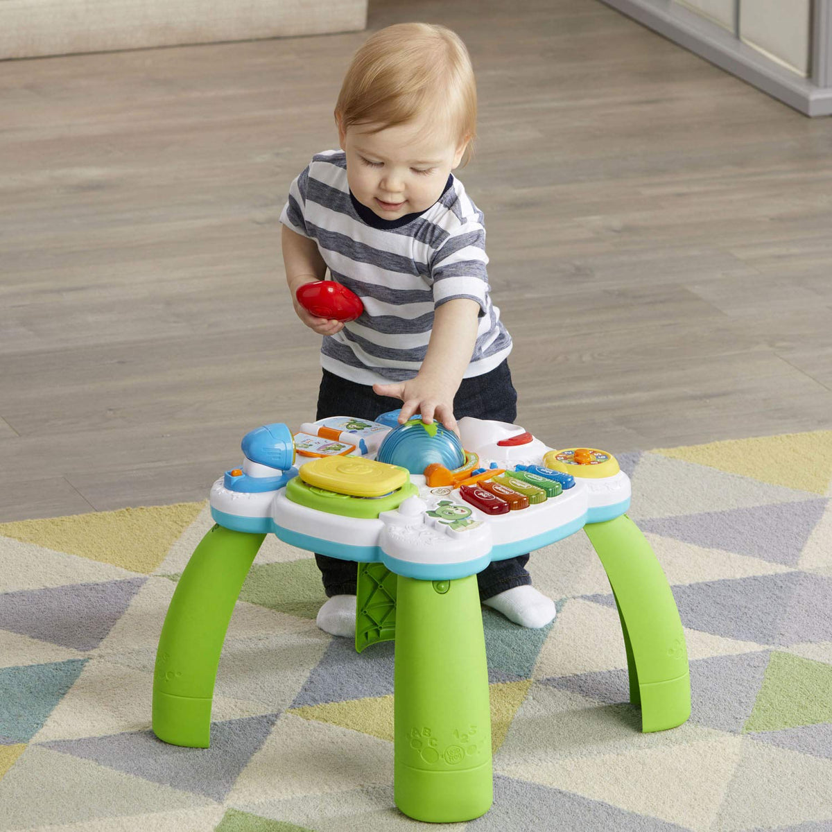 LeapFrog early development educational desk with English and Spanish language settings