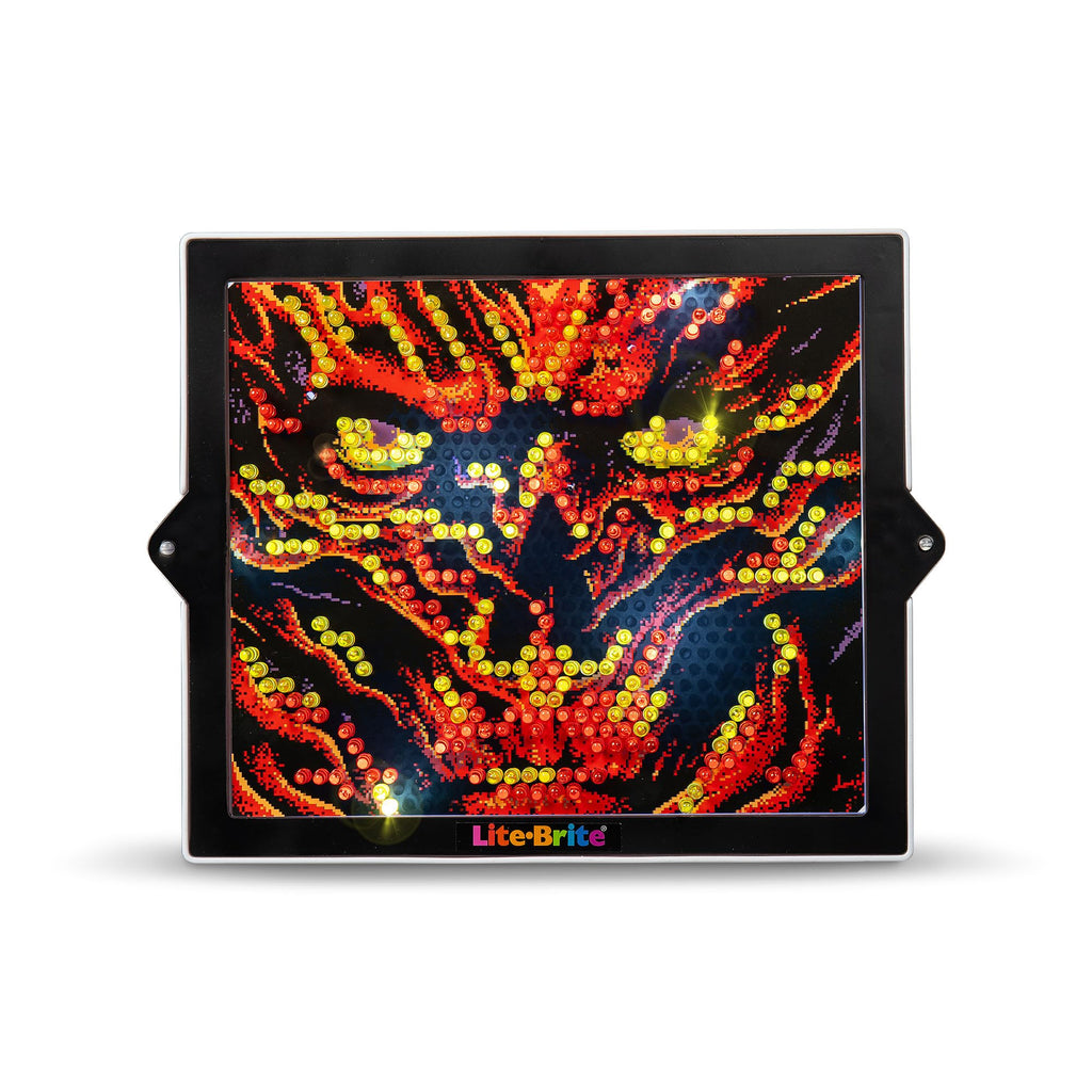 Close up view of the translucent grid panel filled with colorful mini pegs illuminating a red glowing pattern.