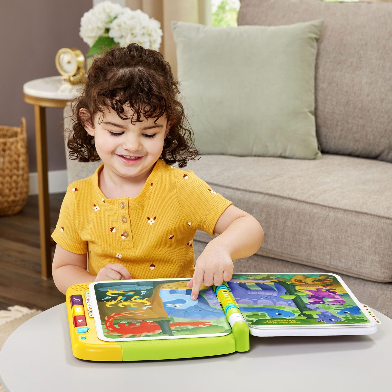 Authentic USA-imported LeapFrog toddler learning book unboxed showing included AA batteries