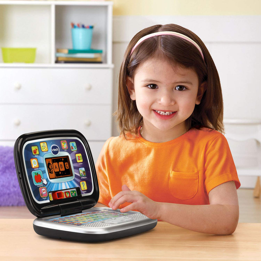 VTech preschool laptop showing detailed view of the screen with penguin character illustration