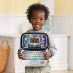 VTech black toy laptop closed down showing its sleek modern outer shell