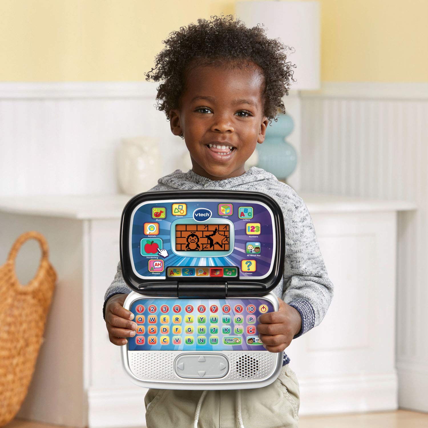 VTech black toy laptop closed down showing its sleek modern outer shell