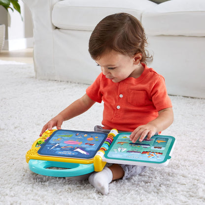 LeapFrog 100 words transportation book open showing water vehicle graphics like boats and cargo ships.