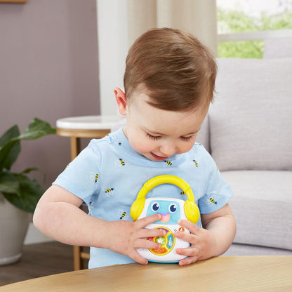 LeapFrog Sing-Along educational toy illuminating its screen face during a learning song playback.