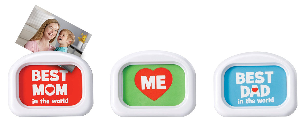 The twenty-six colorful magnetic alphabet tiles from the LeapFrog Fridge Phonics set arranged neatly on a metallic surface.
