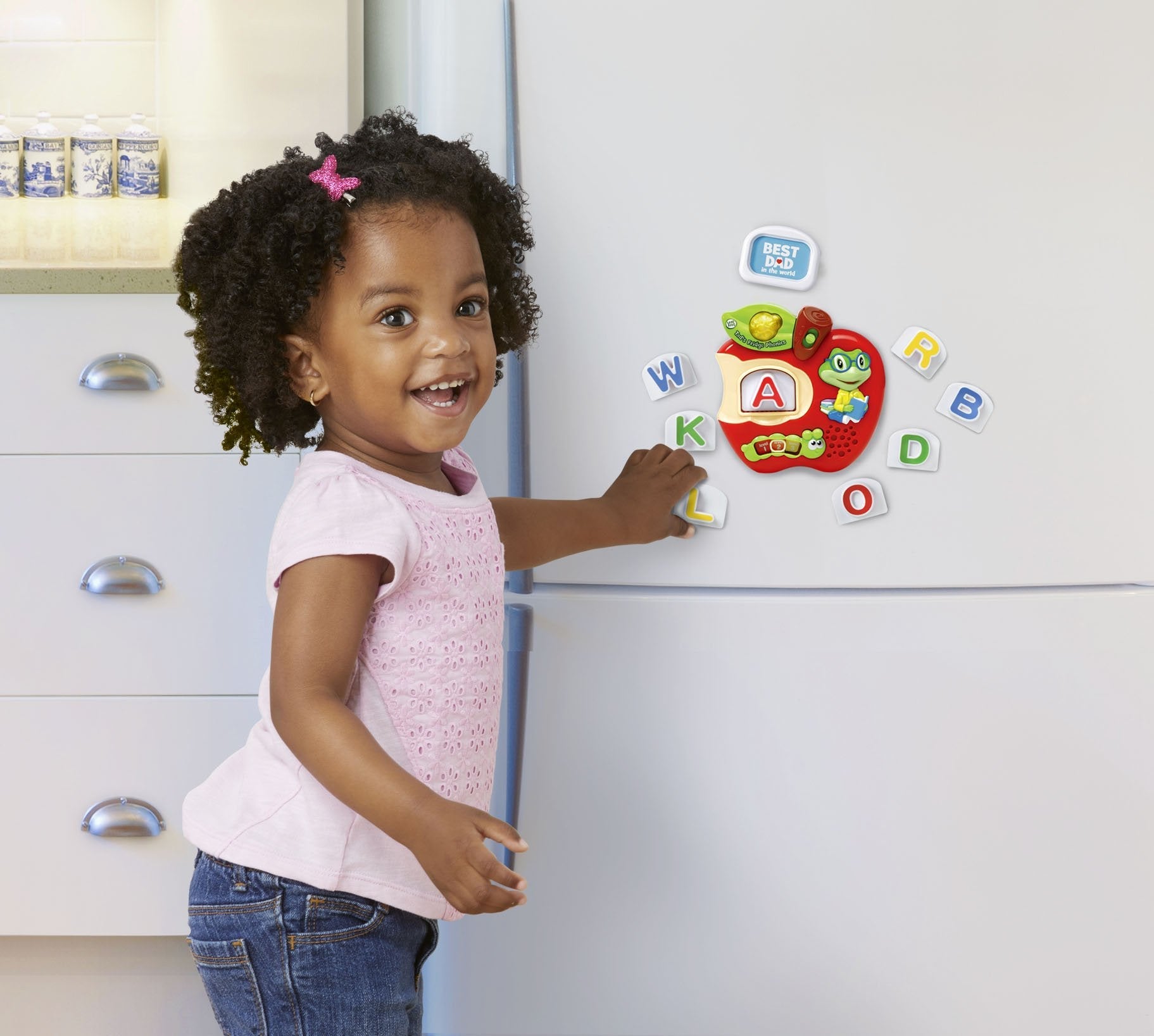 LeapFrog Tad's Fridge Phonics set highlighting the three customizable photo frames with integrated magnetic backing elements.