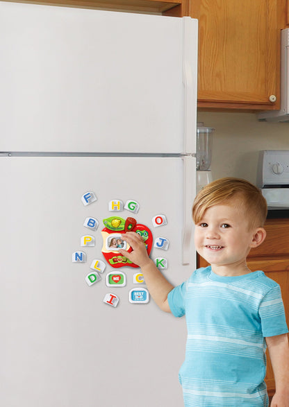 Rear view of the LeapFrog Fridge Phonics main unit demonstrating the placement of secure refrigerator magnets and the battery compartment.