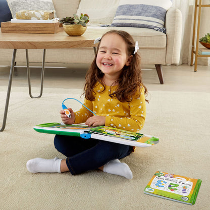Green electronic learning pad for kids ages two to seven packaging view