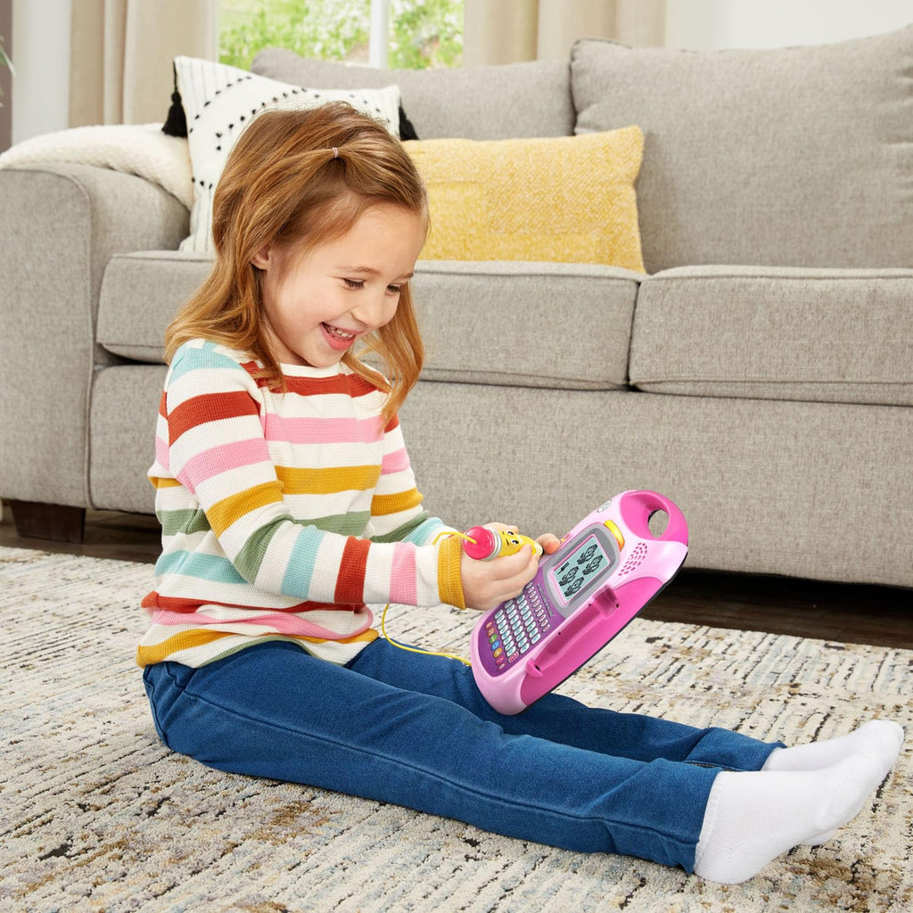 Preschool educational toy with pink frame showing animated letter tracing screen
