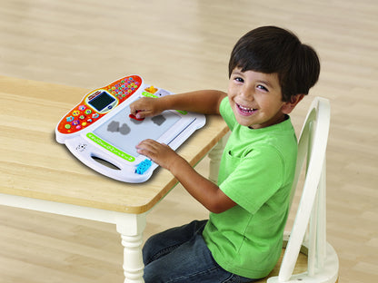 VTech creative learning toy showing included plastic stencils and custom shape stamps