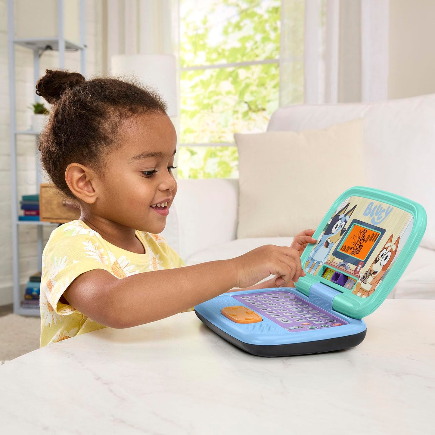Vtech Bluey children device demonstrating the animated backlit display screen area