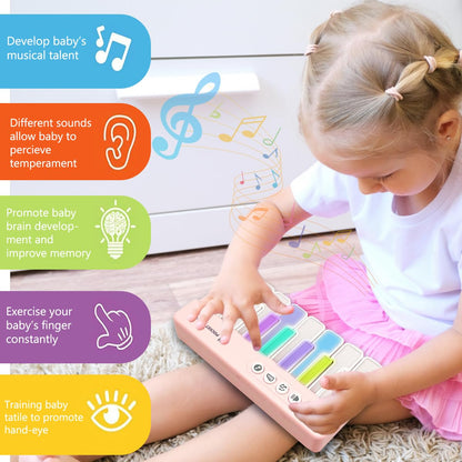 BWNOPQ mini electronic learning toy close up of the function buttons and volume control