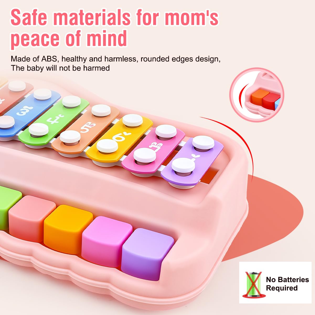 Fizzy Funs Montessori toy keyboard being struck gently by two child safe mallets