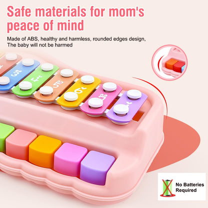 Fizzy Funs Montessori toy keyboard being struck gently by two child safe mallets