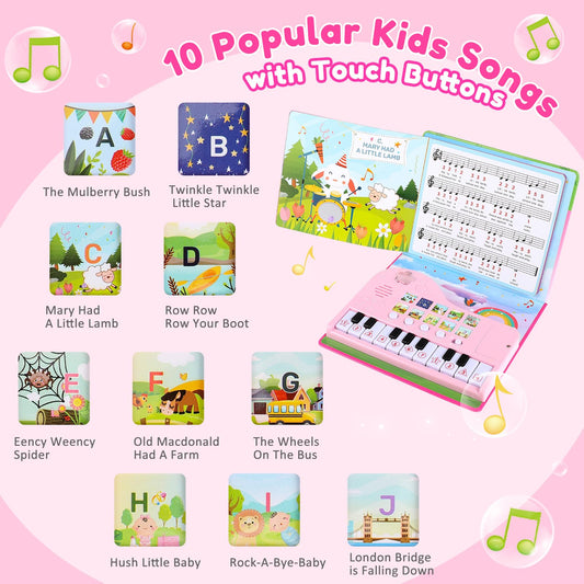 Pink eighteen key children electronic keyboard with illustrated songbook pages open