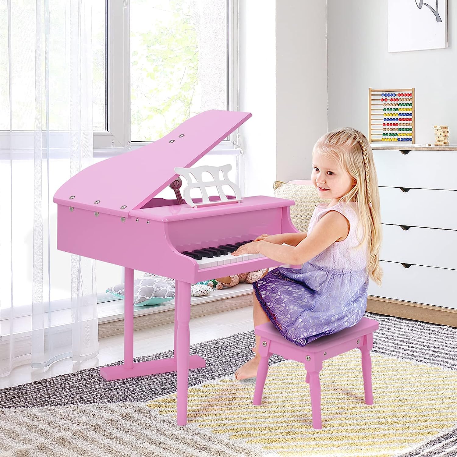 Close up view of premium ABS keys on pink kids educational piano