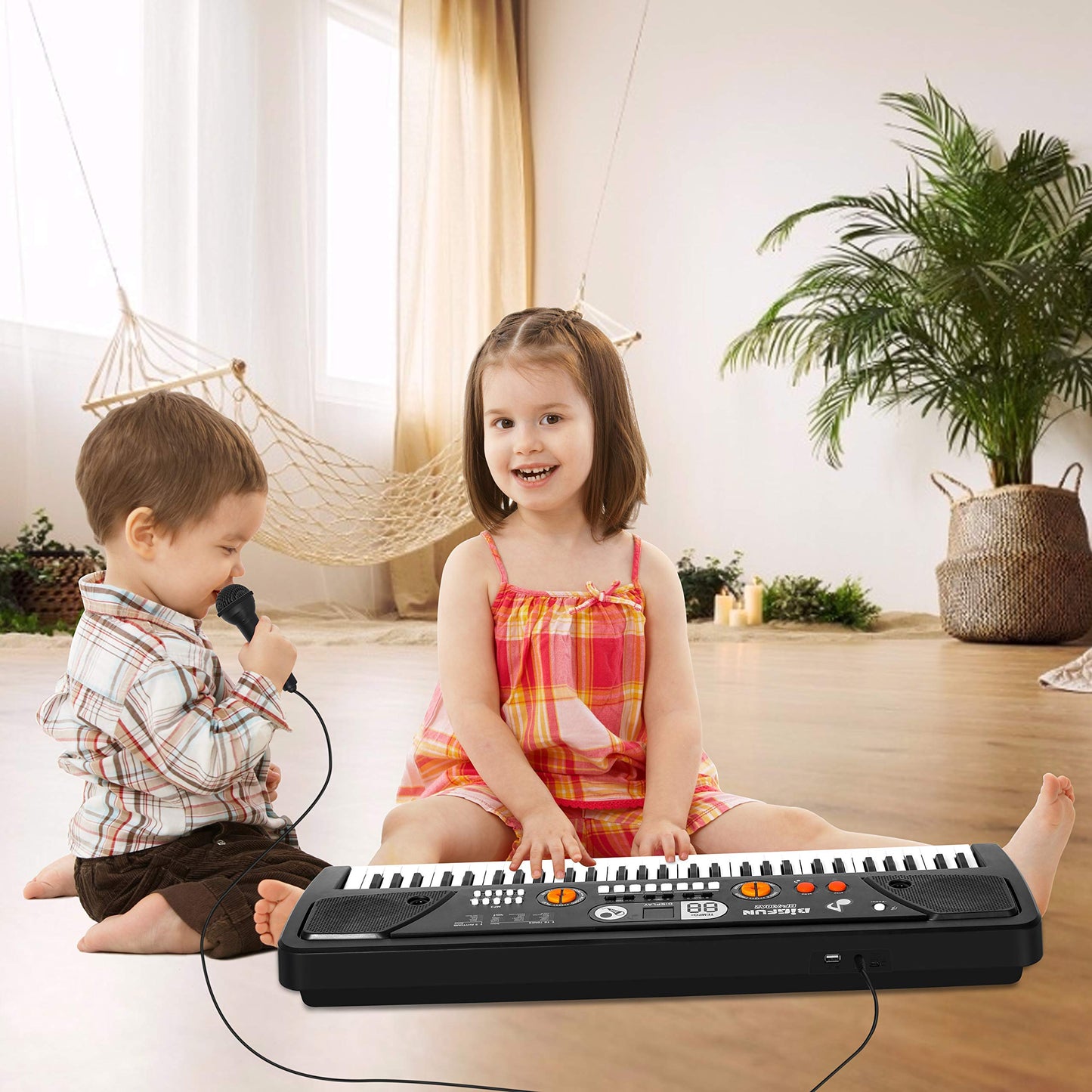 M SANMERSEN musical toy keyboard showcasing the dual speaker configuration and logo detail