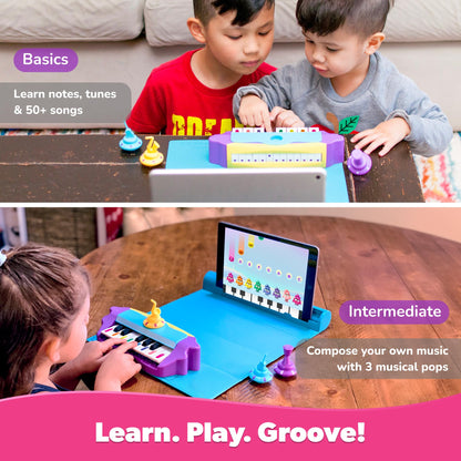 Kids AR musical learning toy showing key mapping stickers on the mini piano.