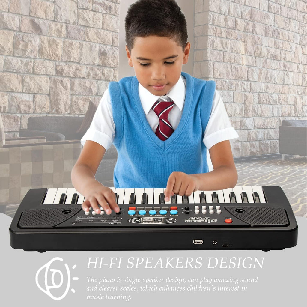 Rear view of the safe eco friendly ABS plastic LeeQee toddler piano showing the battery compartment