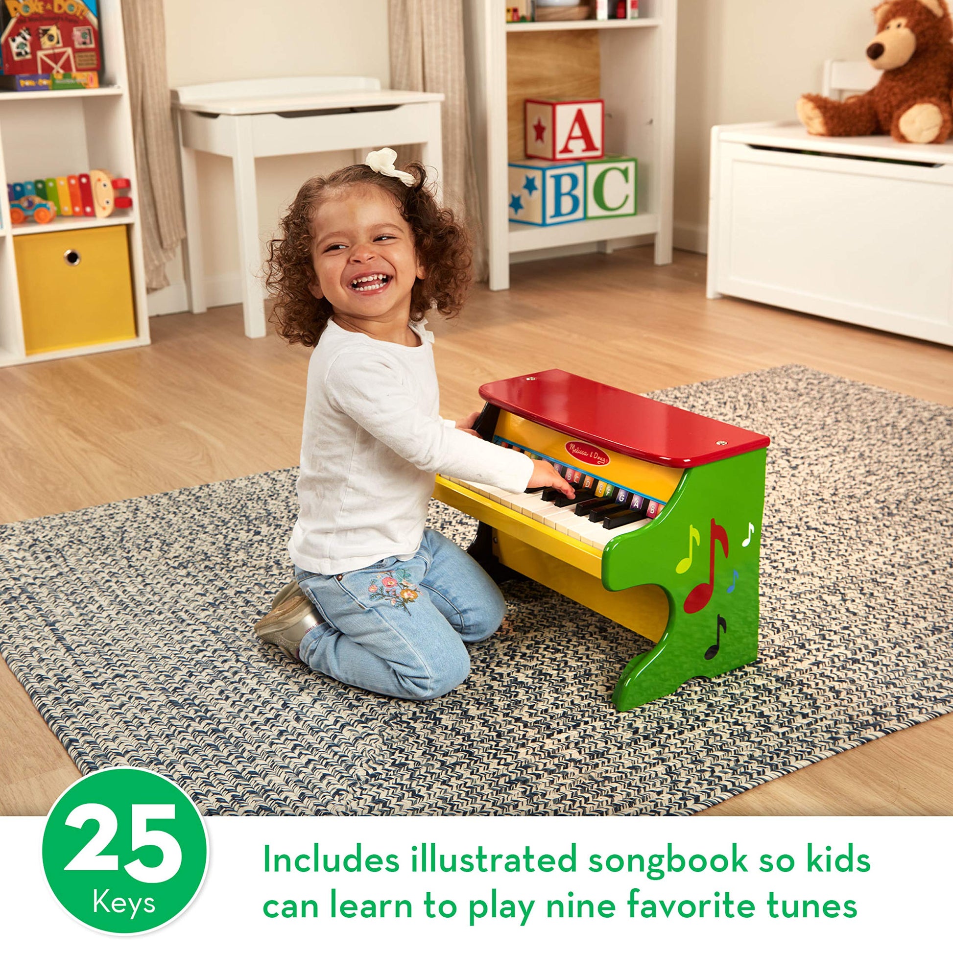 Melissa & Doug wooden toy piano angled view displaying the sturdy upright hardwood construction.