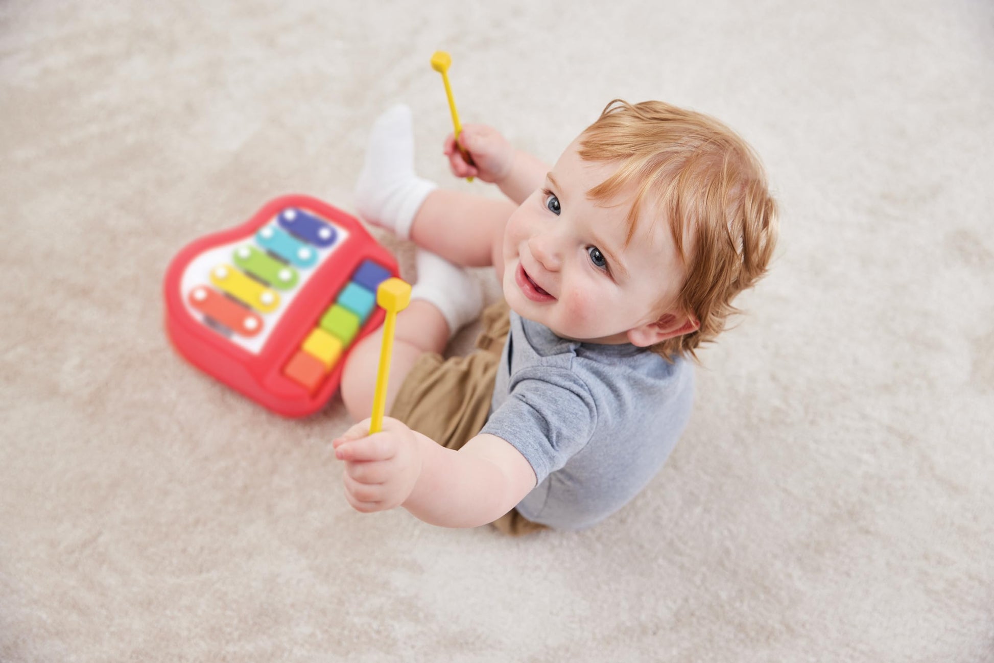 Compact travel-ready perspective of the battery-free Kidoozie piano xylophone toy.