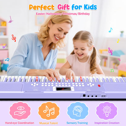 A child practicing hand eye coordination on the TWFRIC purple light up keyboard keys