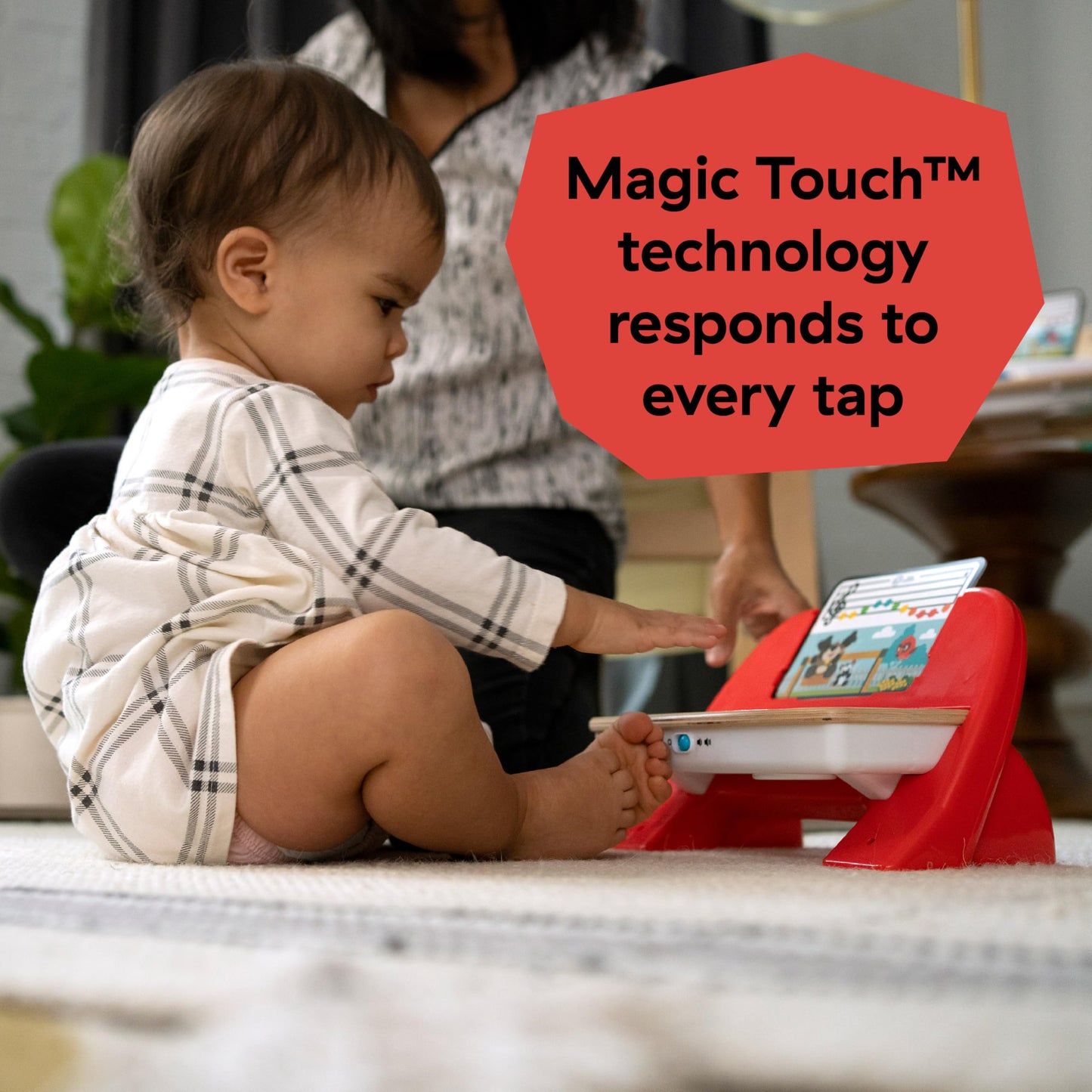 Side angle of the Baby Einstein responsive toddler music player highlighting child safe durable construction.