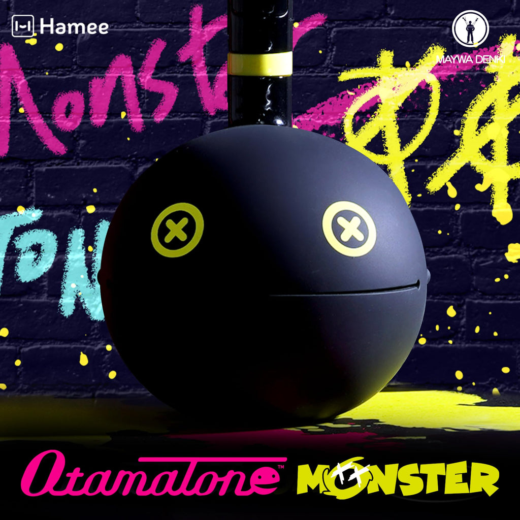 Otamatone Monster synthesizer toy close up of head showing unique monster eyes design