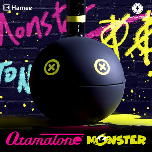 Otamatone Monster synthesizer toy close up of head showing unique monster eyes design