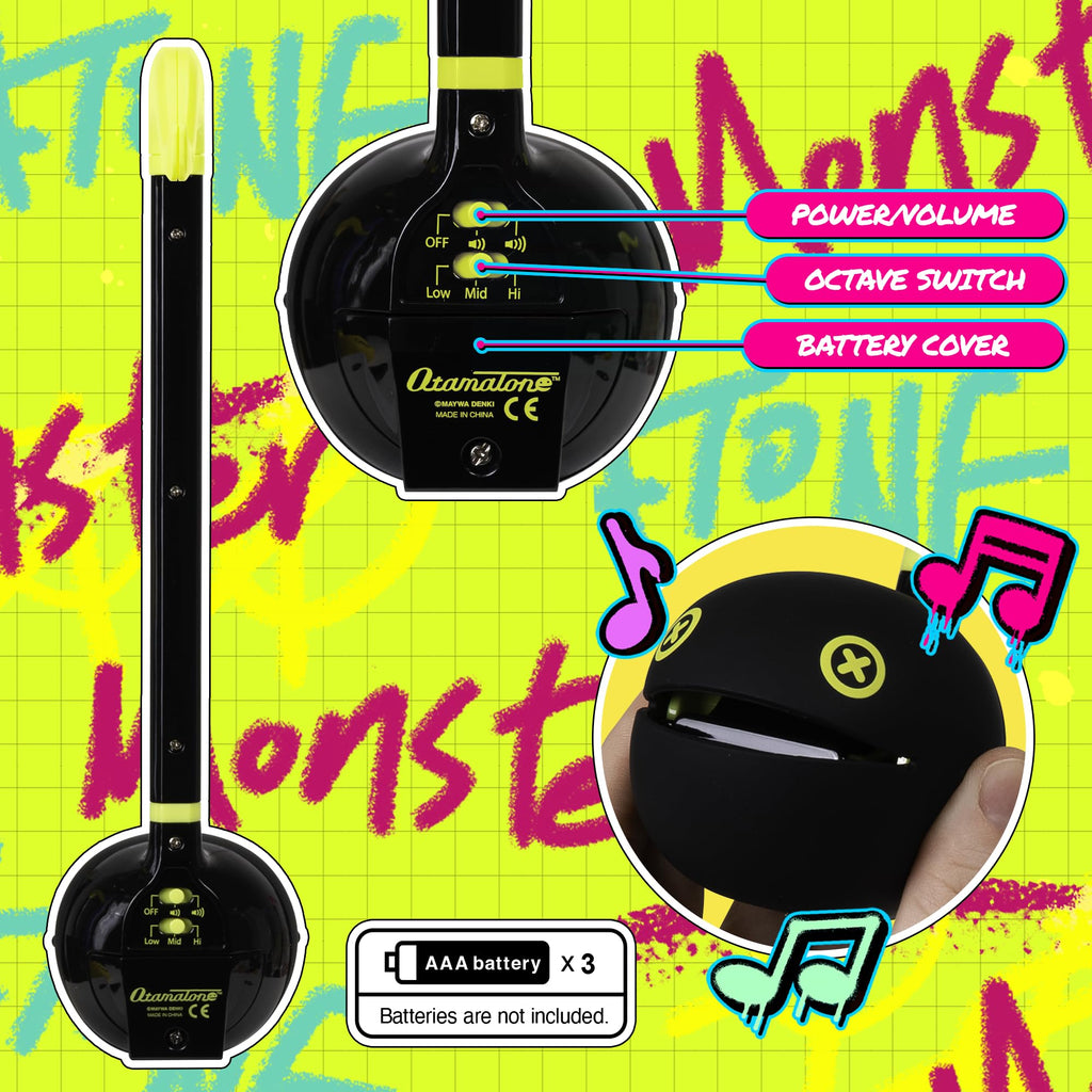 Otamatone Monster lime green musical toy showing the back switch controls for octaves