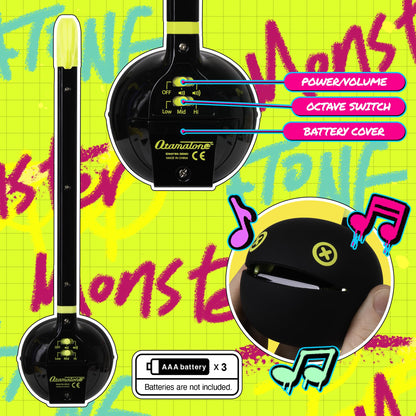 Otamatone Monster lime green musical toy showing the back switch controls for octaves
