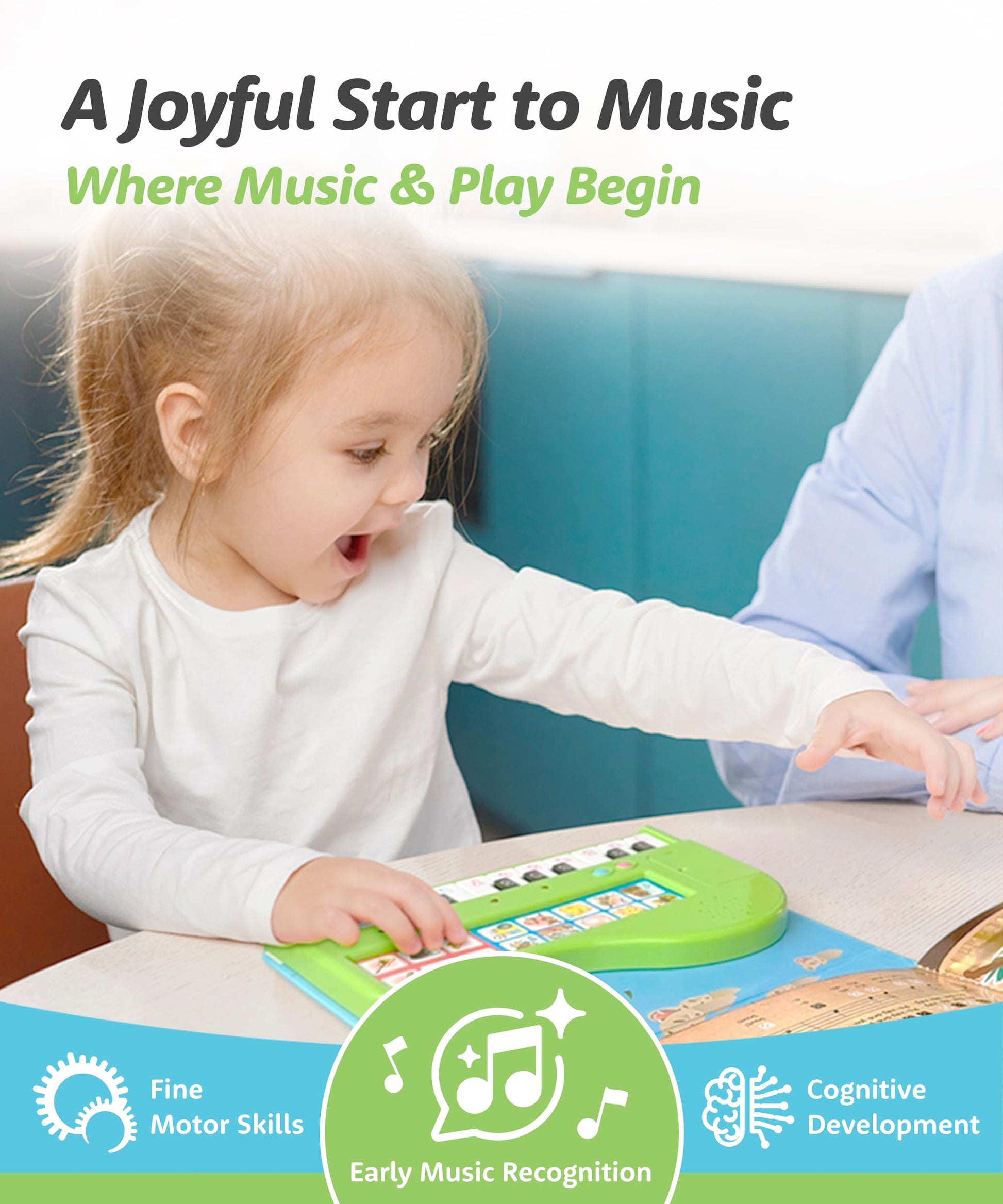 Toddler hand pressing the pressure sensitive polyphonic keys on the imported BEST LEARNING music book.