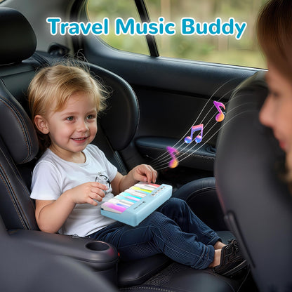 Back view of the battery-operated iPlay, iLearn toddler piano showing safety compartment.