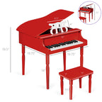 Vibrant red children's miniature grand piano toy with the top lid propped open to amplify acoustics.