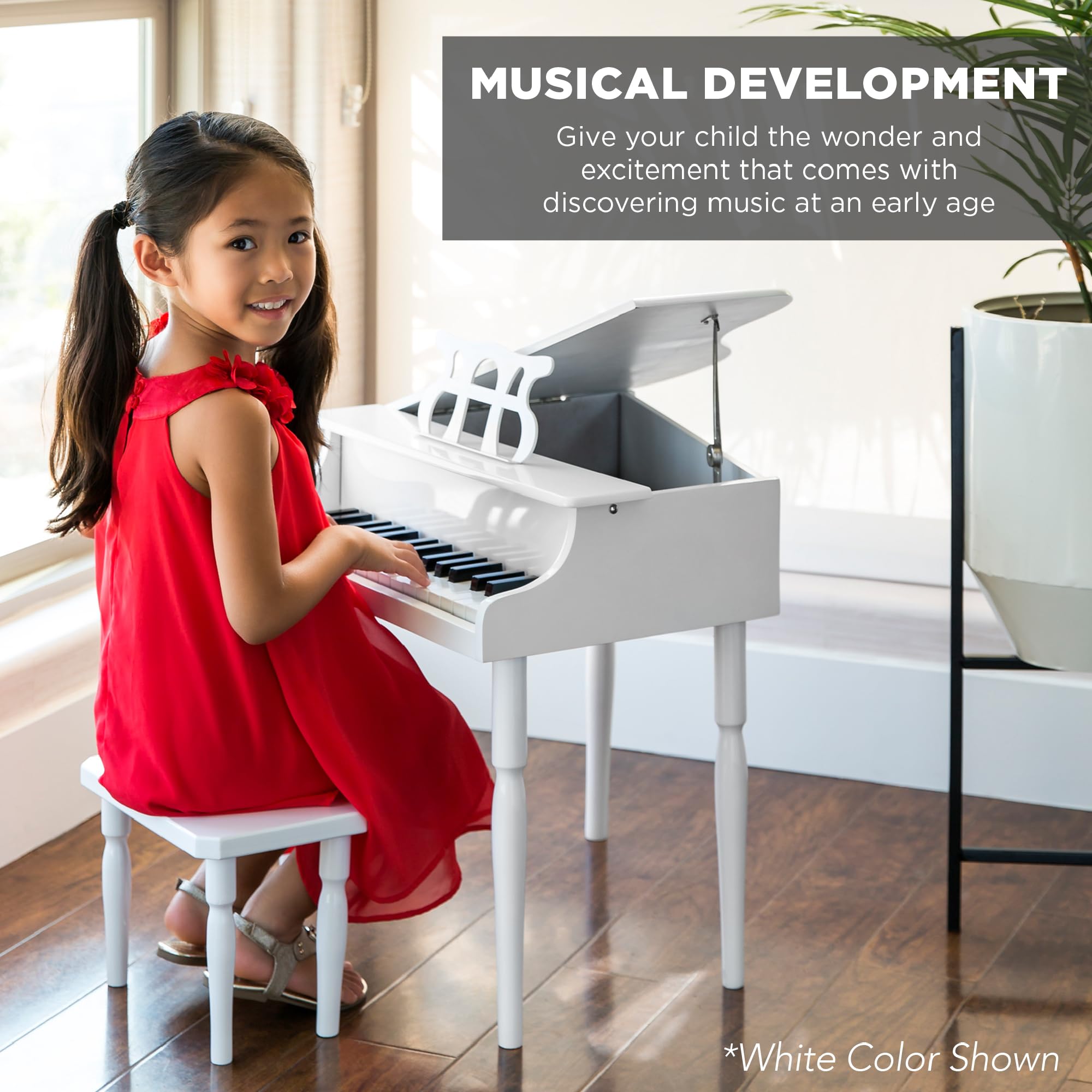 Side profile of the Best Choice Products kids wooden piano highlighting the glossy enamel finish and sturdy legs.