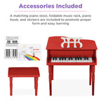 The complete kids musical instrument set including the red wooden piano, folding music rack, songbook, and stool.