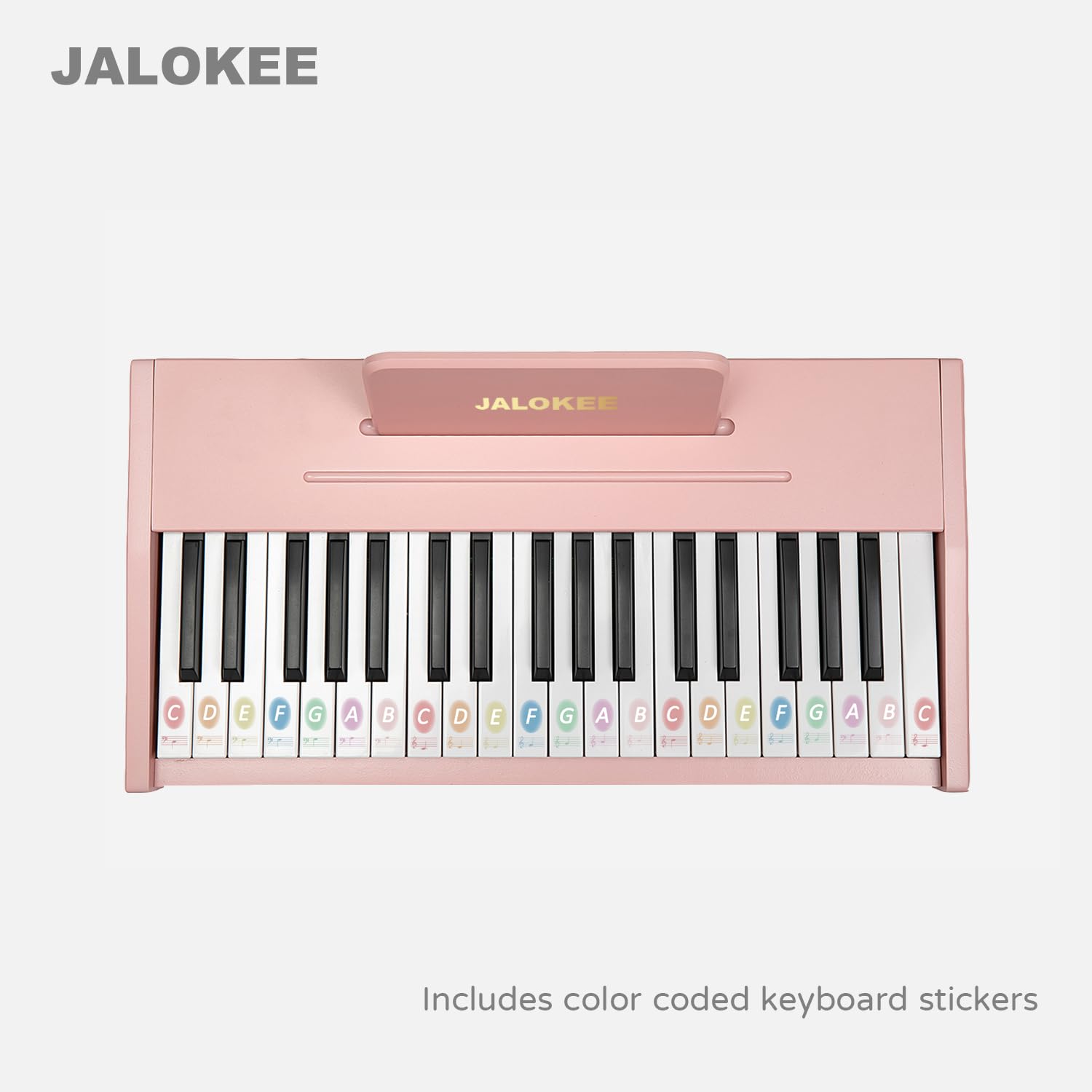 Durable children's electronic toy keyboard with colored stickers applied