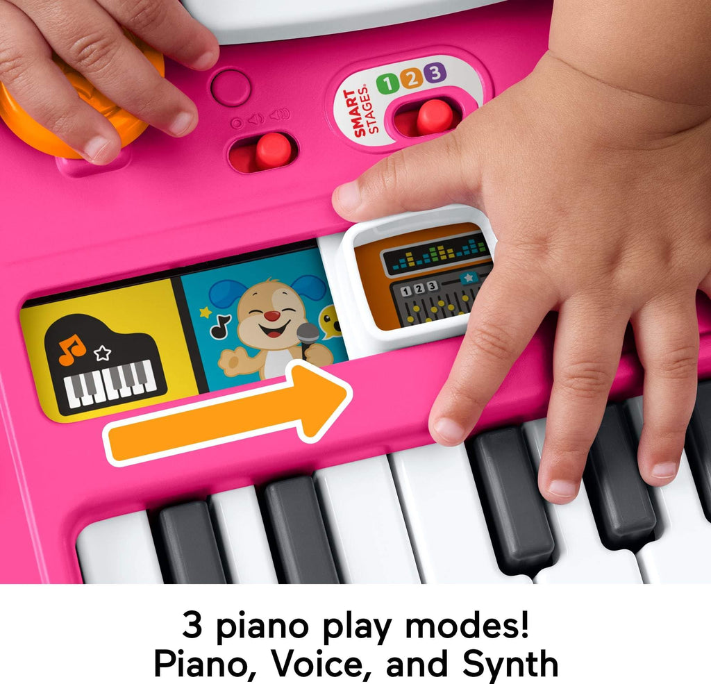 Fisher-Price baby DJ table showing gray detachable legs and interactive toy sliders