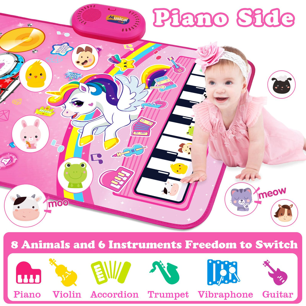 Close up view of the electronic drum pad area on the unicorn play mat with two included child safe drumsticks resting on top